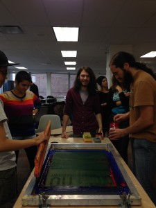 Participants in the Art for Action workshop in November making prints. 